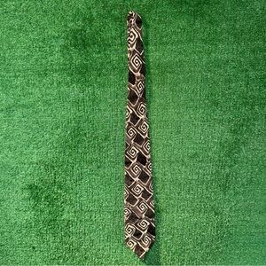 Vintage Oaktree tie in a brown, black, and beige African Kuba textile pattern